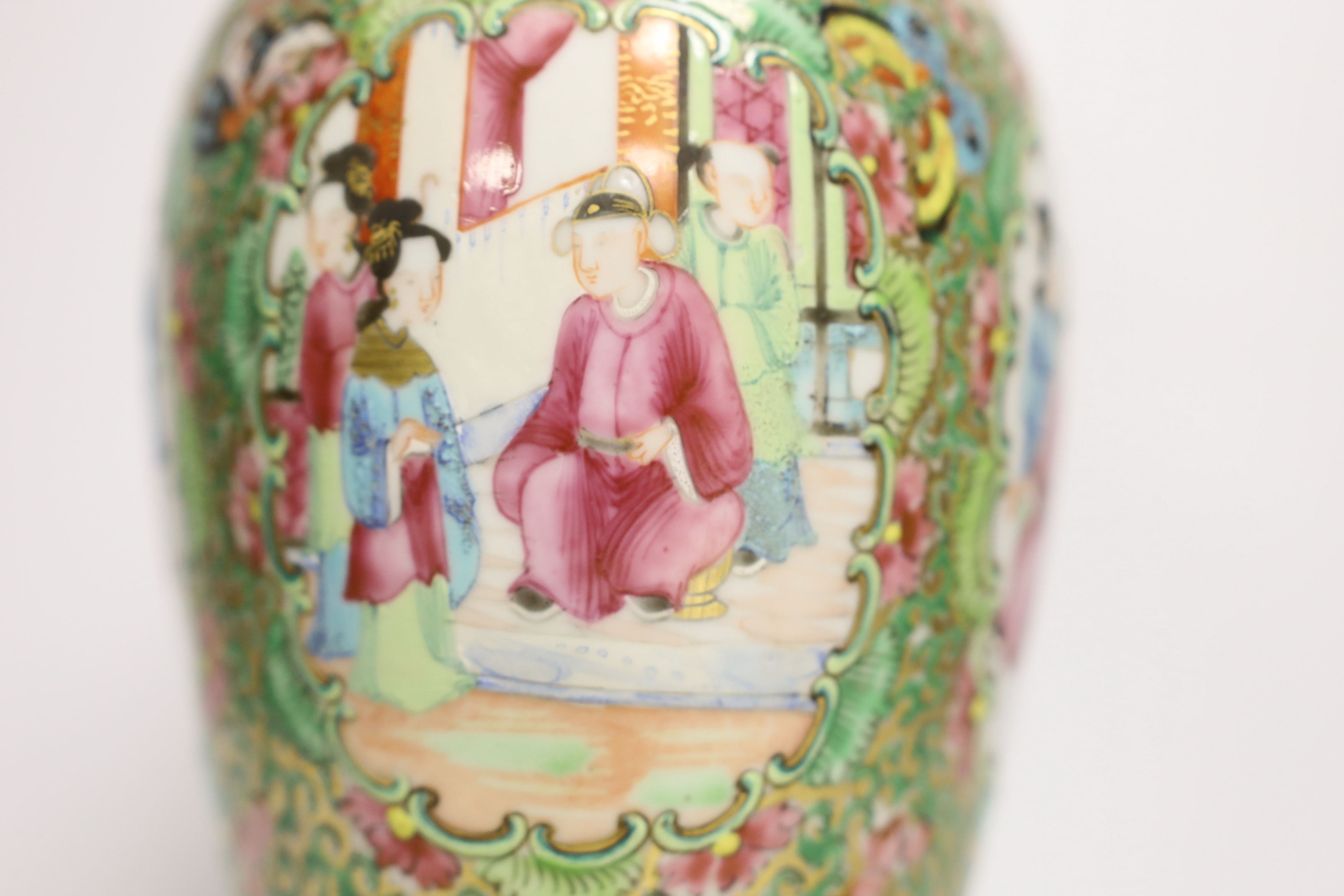 Chinese porcelain- a tall 19th century famille rose vase and cover, a famille rose jar, early 19th century probably made the Indian market, a famille noire jar and a Japanese vase, tallest 28cm high